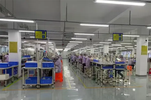 Cleanroom vape production line with trained technicians assembling disposable e-cigarettes